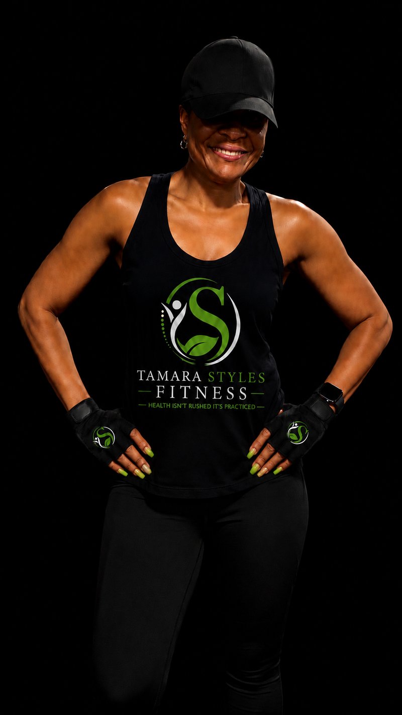 Tamara Styles, personal trainer and founder of Tamara Styles Fitness, in a branded tank top reading "Health Isn't Rushed It's Practiced"
